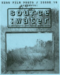 the blue cover of kzoo film photo issue 10 that reads "kzoo film photo / issue 10 presents: source:Water vol. 01. there is an image of dune grass on the cover below the text.