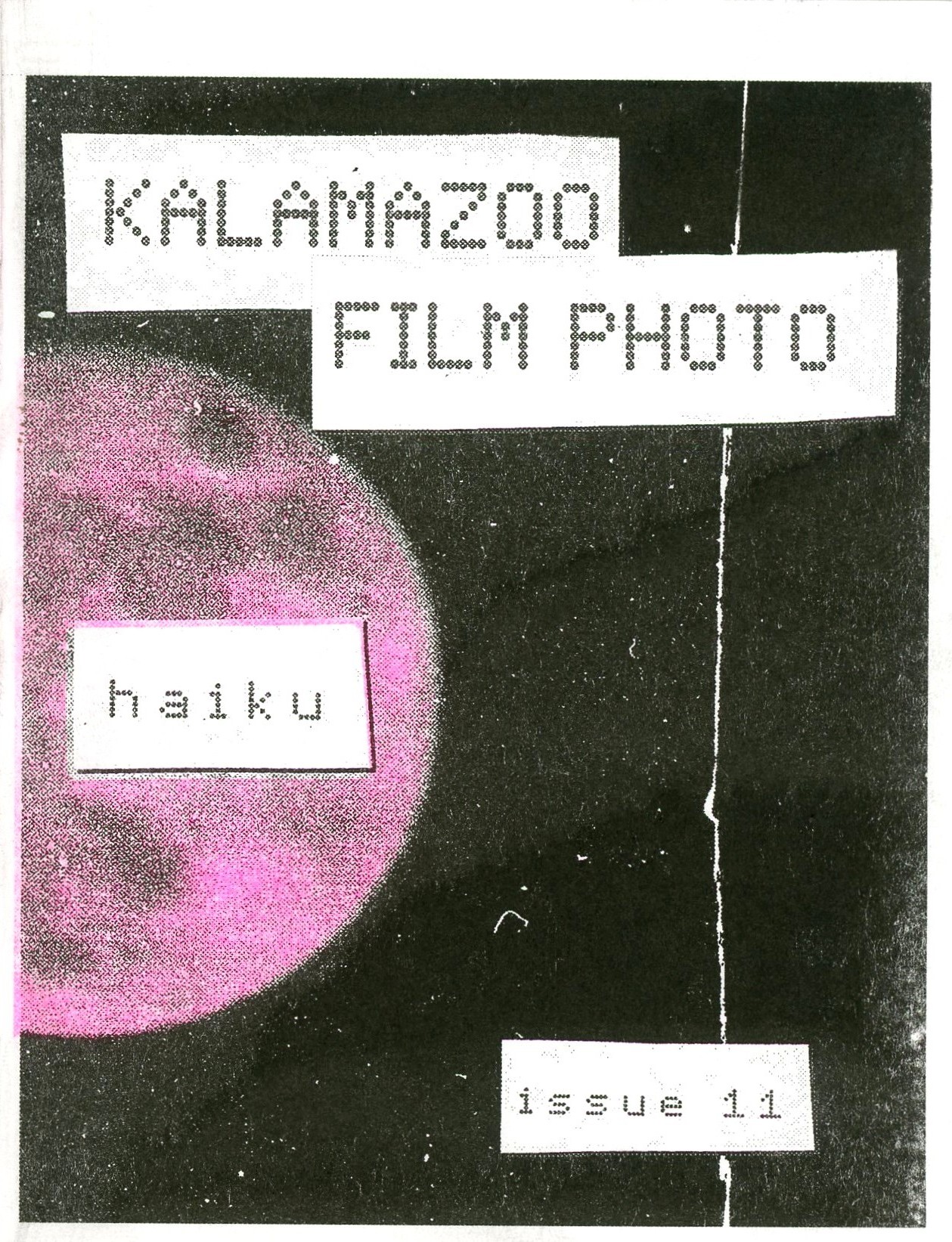 image of the front cover of kzoo film photo issue 11 zine, the cover is black with a pink moon partially visible. text reads "KALAMAZOO FILM PHOOTO, HAIKU, ISSUE 11"